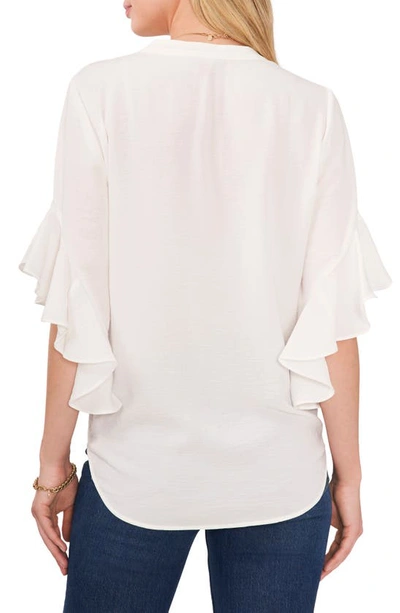 Shop Vince Camuto Ruffle Sleeve Split Neck Blouse In New Ivory