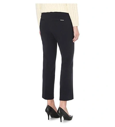 Shop Michael Michael Kors Slim-fit Cropped Jersey Trousers In New Navy