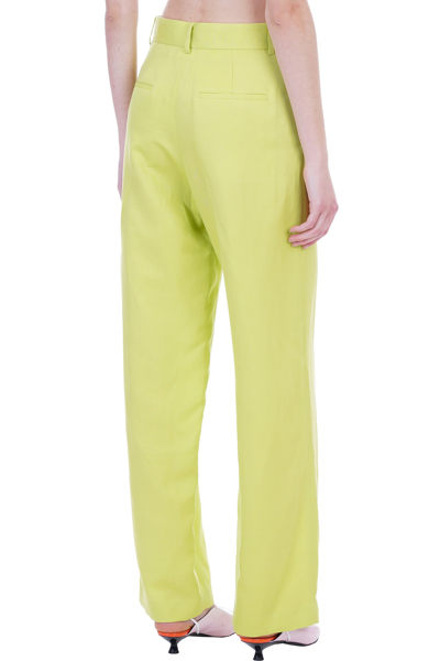 Shop Msgm Pants In Green Cotton