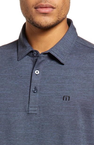 Travismathew The Heater Solid Short Sleeve Performance Polo In Vintage Indigo/ Black