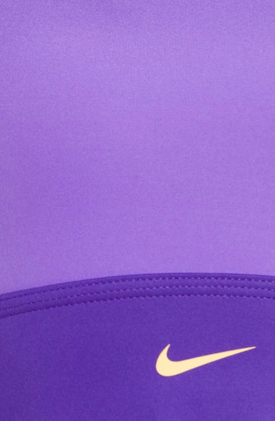 Shop Nike Dri-fit Swoosh Padded Longline Sports Bra In Psychic Purple/melon Tint