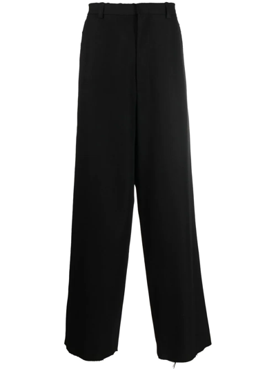 Shop Balenciaga Worn Out Wide-leg Trousers In Black