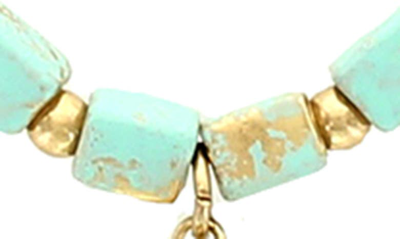 Shop Olivia Welles Patina Brick Tassel Necklace In Worn Gold / Mint