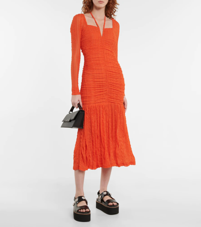 Shop Ganni Textured Ruched Jersey Midi Dress In Orangedotcom