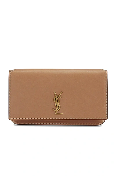 Shop Saint Laurent Phone Holder Strap Bag In Vintage Brown Gold