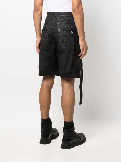 Shop Balmain Oversized Coated Denim Shorts In Black