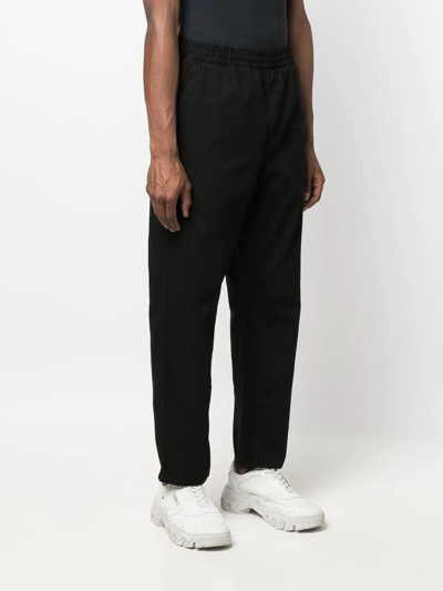 Shop Carhartt Flint Logo-patch Trousers In Black