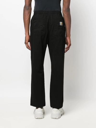 Shop Carhartt Flint Logo-patch Trousers In Black