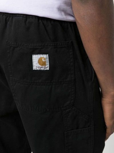 Shop Carhartt Flint Logo-patch Trousers In Black