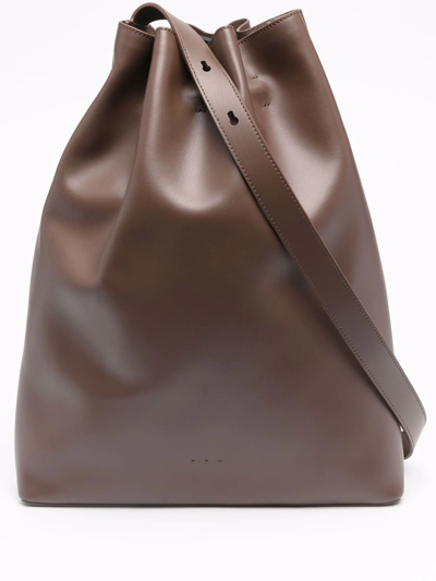 Shop Aesther Ekme Maxi Marin Drawstring Shoulder Bag In Brown