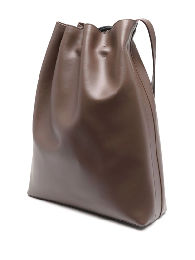 Shop Aesther Ekme Maxi Marin Drawstring Shoulder Bag In Brown