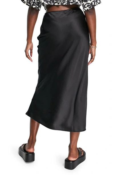 Shop Topshop Bias Cut Satin Midi Skirt In Black