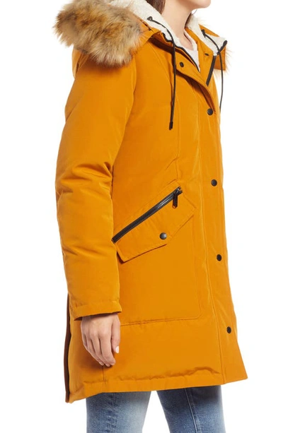 Shop Sam Edelman Hooded Down & Feather Fill Parka With Faux Fur Trim In Golden Yellow