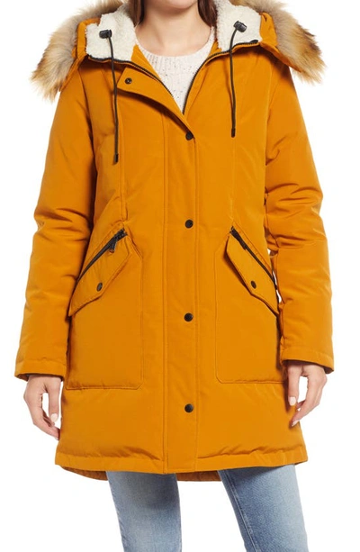 Shop Sam Edelman Hooded Down & Feather Fill Parka With Faux Fur Trim In Golden Yellow