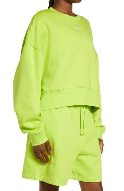 Shop Nike Sportswear Essential Oversize Sweatshirt In Atomic Green/ White
