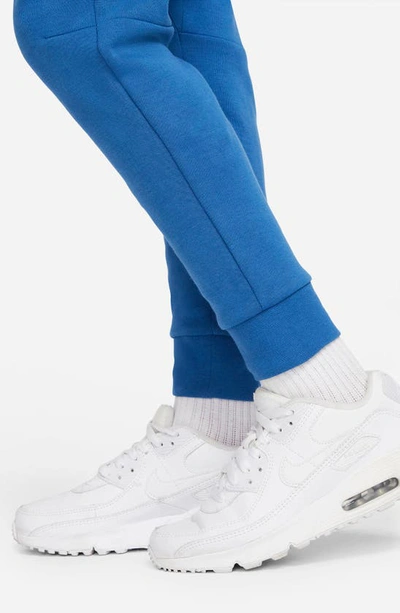 Shop Nike Tech Fleece Pants In Dk Marina Blue/ Light Bone