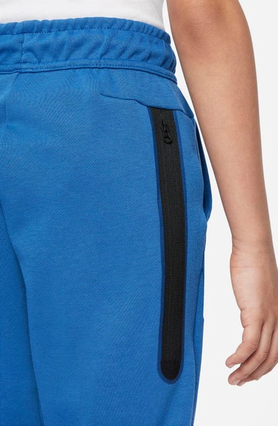 Shop Nike Tech Fleece Pants In Dk Marina Blue/ Light Bone