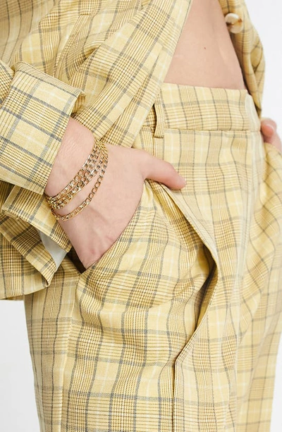 Shop Topshop Pleated Plaid Wide Leg Trousers In Yellow