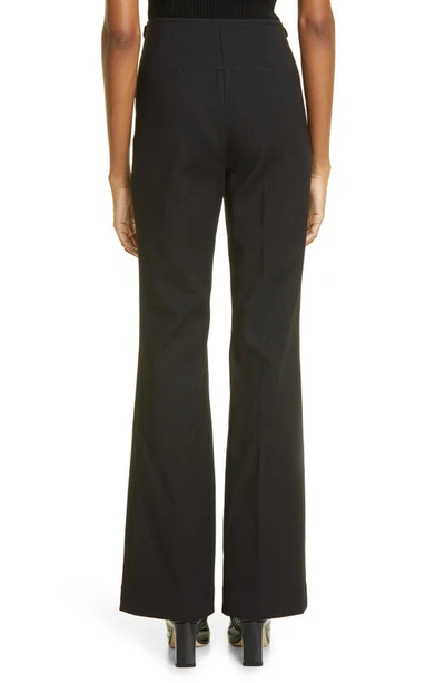 Shop Courrèges Stretch Crepe Bootcut Trousers In Black