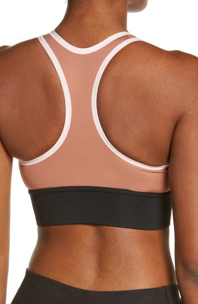 Shop Nike Dri-fit Swoosh Padded Longline Sports Bra In Mineral Clay/ Atmosphere