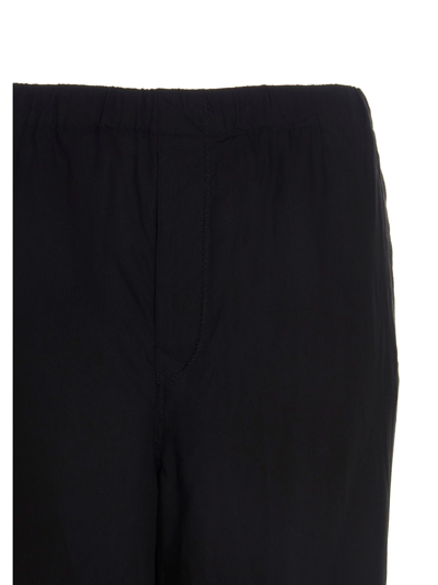 Shop Undercover Loose Trousers In Black