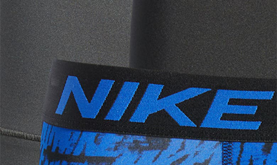 Shop Nike 3-pack Dri-fit Essential Micro Trunks In Game Royal/ Smoke Grey/ Black