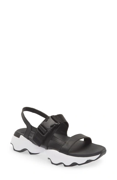 Shop Sorel Kinetic Impact Slingback Sandal In Black White