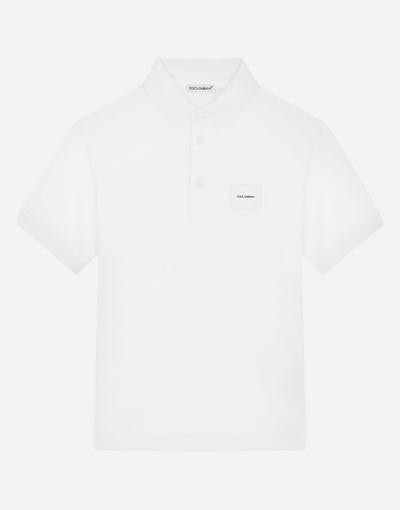 Shop Dolce & Gabbana Piqué Polo Shirt With Logo Plate In White