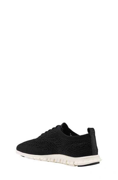 Shop Cole Haan Zerøgrand Stitchlite Wingtip Oxford Sneaker In Black Knit Fabric