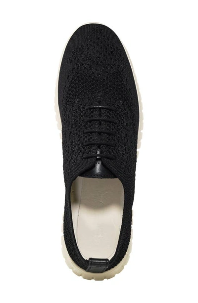 Shop Cole Haan Zerøgrand Stitchlite Wingtip Oxford Sneaker In Black Knit Fabric