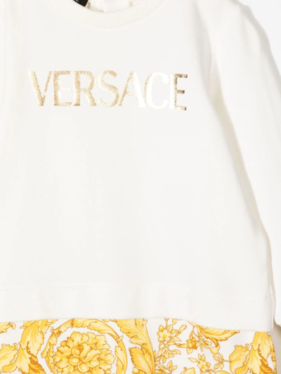 Shop Versace Logo-print Long-sleeve Romper In White