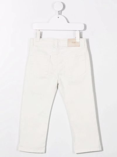Shop Knot Slim-cut Denim Jeans In White
