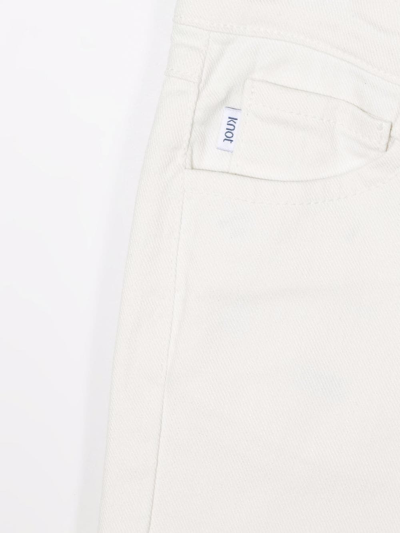 Shop Knot Slim-cut Denim Jeans In White