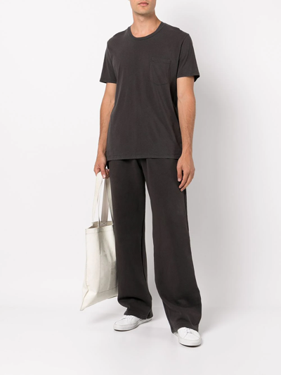 Shop Les Tien Puddle Wide-leg Cotton Track Pants In Black