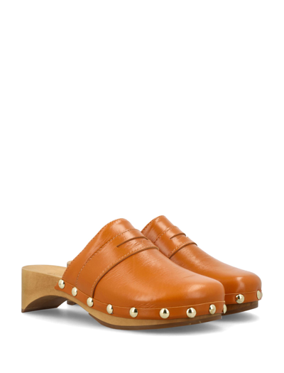 Shop By Far Hans Gloss Leather Clogs In Caramel