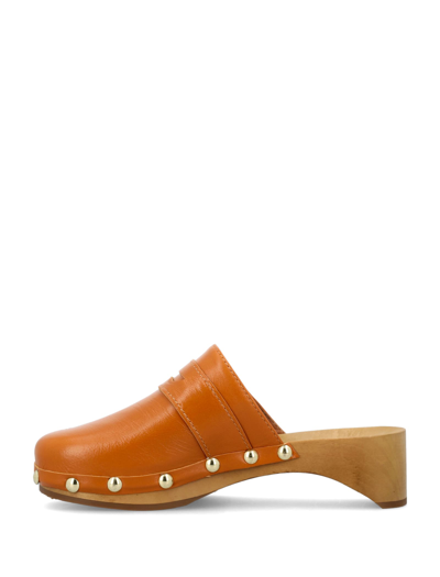 Shop By Far Hans Gloss Leather Clogs In Caramel