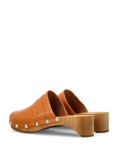 Shop By Far Hans Gloss Leather Clogs In Caramel