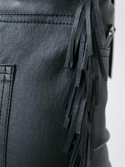 Shop Saint Laurent Fringed Leather Trousers In Black