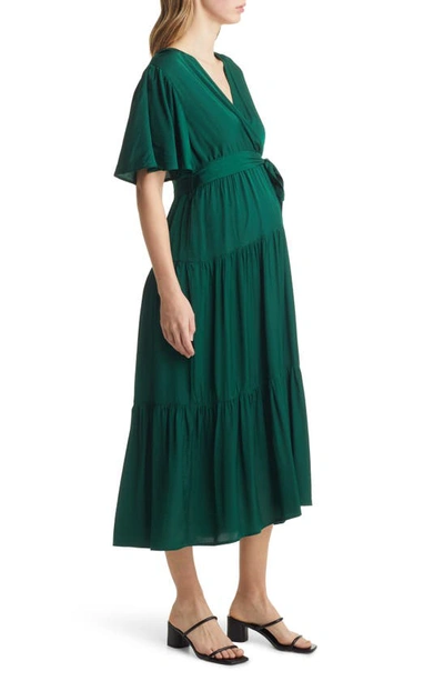 Shop Angel Maternity Crossover Faux Wrap Maternity Maxi Dress In Green