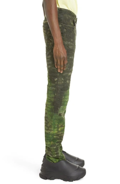 Shop Givenchy Paint Distressed Jeans In Yellow/green