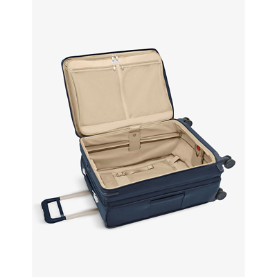 Shop Briggs & Riley Baseline Soft-shell 4-wheel Expandable Suitcase 66cm In Navy