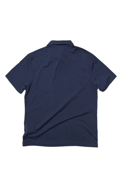 Shop Rhone Commuter Polo In Navy