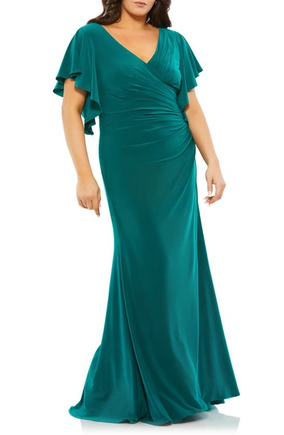 Shop Mac Duggal Butterfly Sleeve Jersey Gown In Emerald