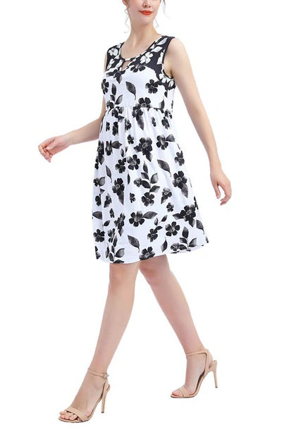 Shop Kimi And Kai Eliana Floral Print Skater Maternity Dress In Black/ White
