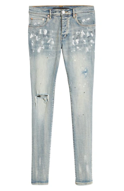 Shop Purple Brand Ripped Knee Blowout Painted Skinny Jeans In Light Indigo Paint Blowout