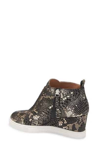 Linea Paolo Felicia Iii Wedge Sneaker In Black Snake Print Leather