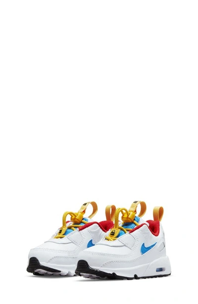 Shop Nike Kids' Air Max 90 Toggle Sneaker In White/ Photo Blue/ Gold