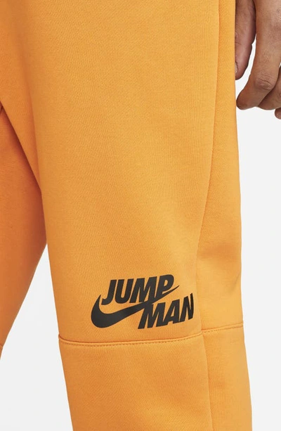 Shop Nike Jordan Jumpman Fleece Sweatpants In Light Curry/ Black