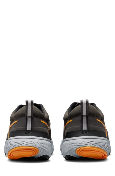 Shop Nike React Miler 2 Running Shoe In Ash/ Kumquat/ Black/ Grey