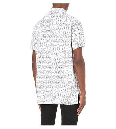 Shop Givenchy Star-print Cotton-pique Polo Shirt In White